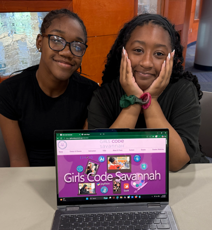 Girls Code Savannah students Maliya and Erie testing responsive layout frameworks and UI/UX design elements during the website redesign collaboration